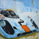 Illustration for article titled The most iconic race cars in history captured in beautiful paintings